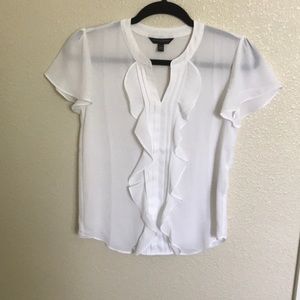 White ruffle blouse